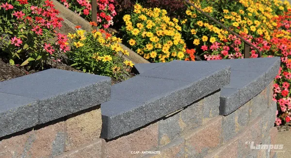 Versa-Lok Standard C-Cap capstone on top of a retaining wall